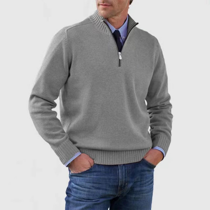 Men's mock neck half-zip sweater with ribbed trim, perfect for autumn and winter layering.
