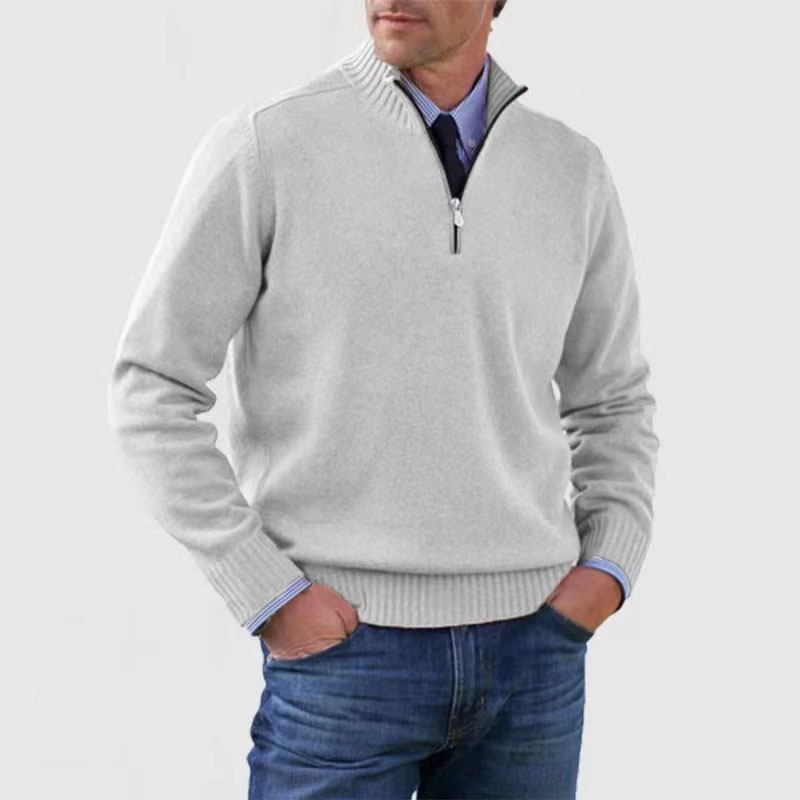 Comfortable long-sleeve men's mock neck half-zip sweater with ribbed cuffs and hem.