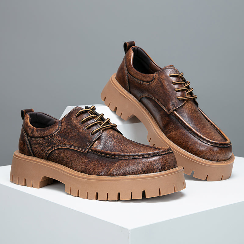 Close-up showing the comfortable outsole of men's brown casual boots for traction