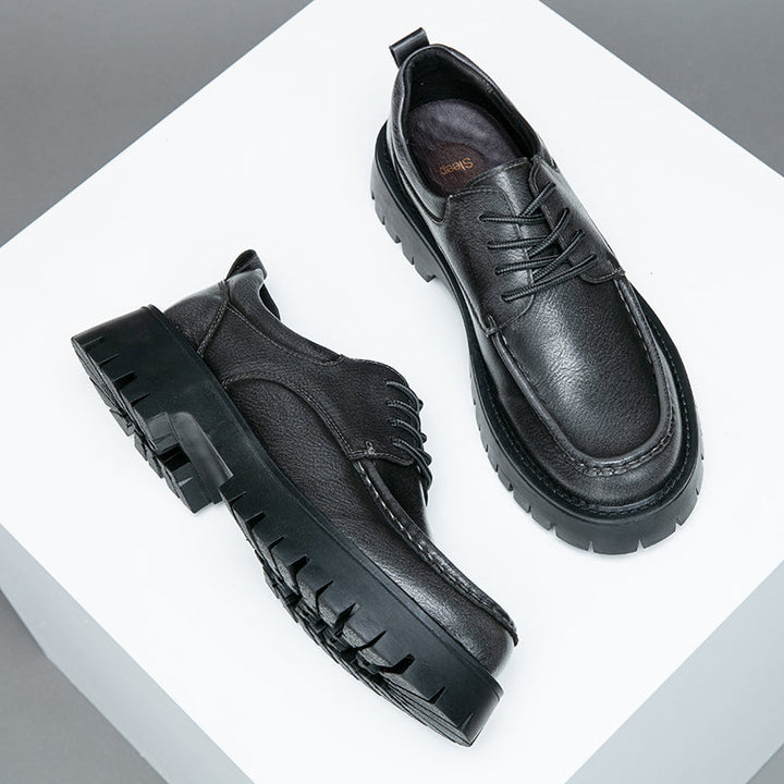Brown men's casual boots in a studio setting, showcasing their premium craftsmanship