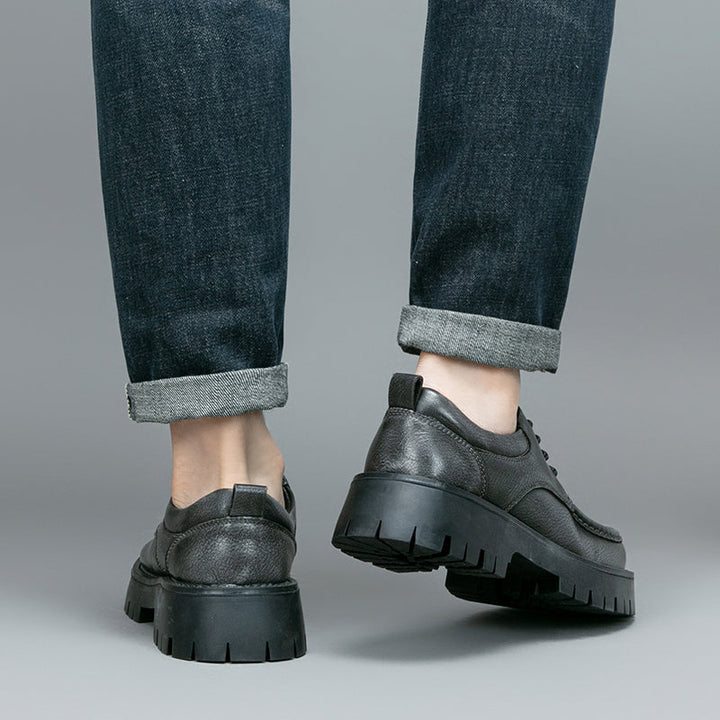 Stylish and comfortable men's grey casual boots, showcasing their quality construction