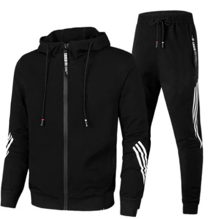 Close-up of the fabric texture of the men's modern streetwear hoodie and jogger set, highlighting comfort.
