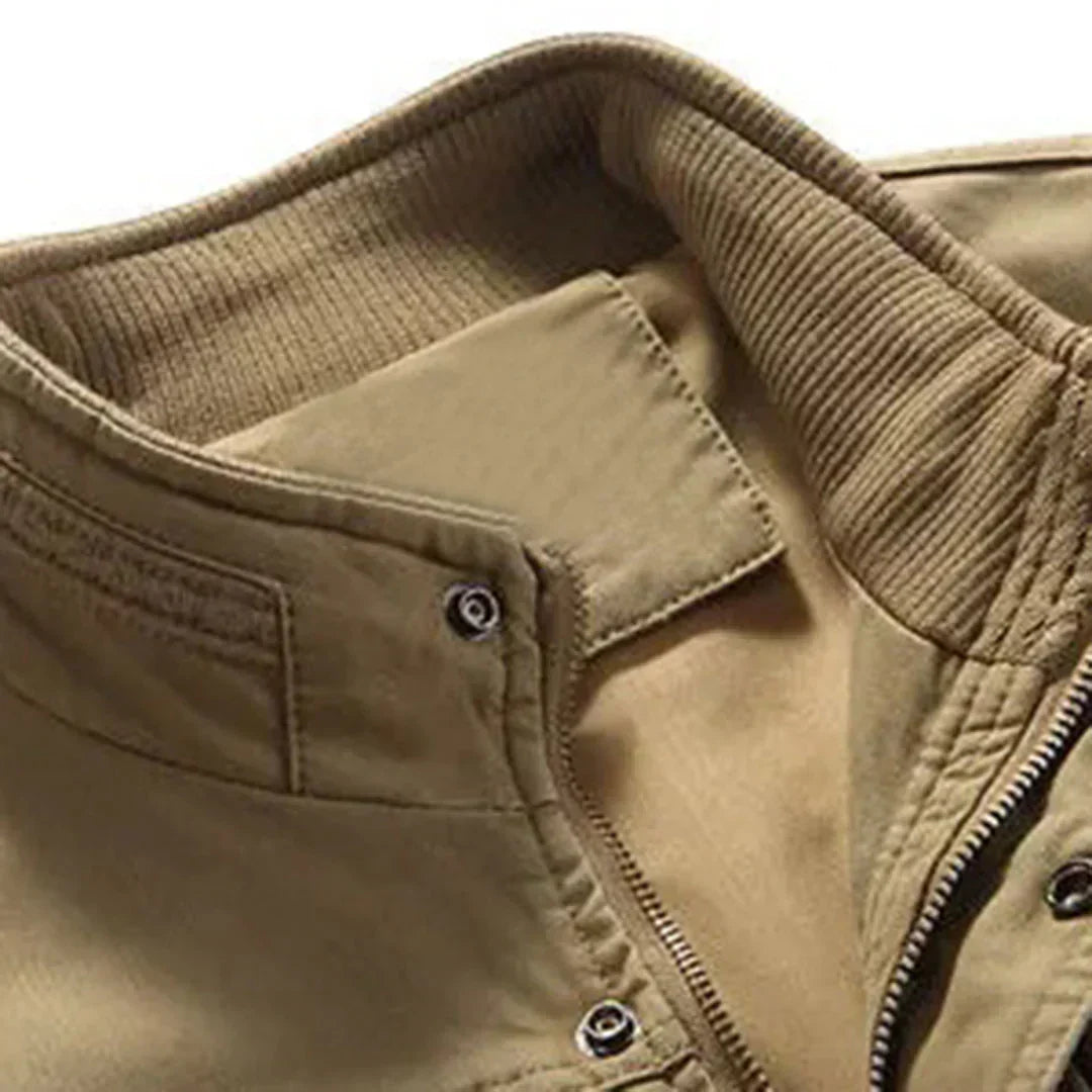 Sleeveless men's multi-pocket vest. Practical utility vest for hiking, fishing, and travel. Khaki & green options.