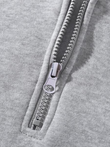 Comfortable men's half-zip cotton blend hoodie, available in black, gray, and navy, great for casual style.