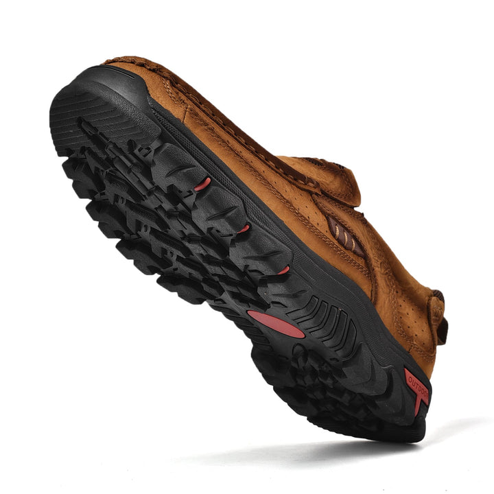 Pair of brown orthopedic men's transition boots, comfortable sole visible, perfect for daily wear.