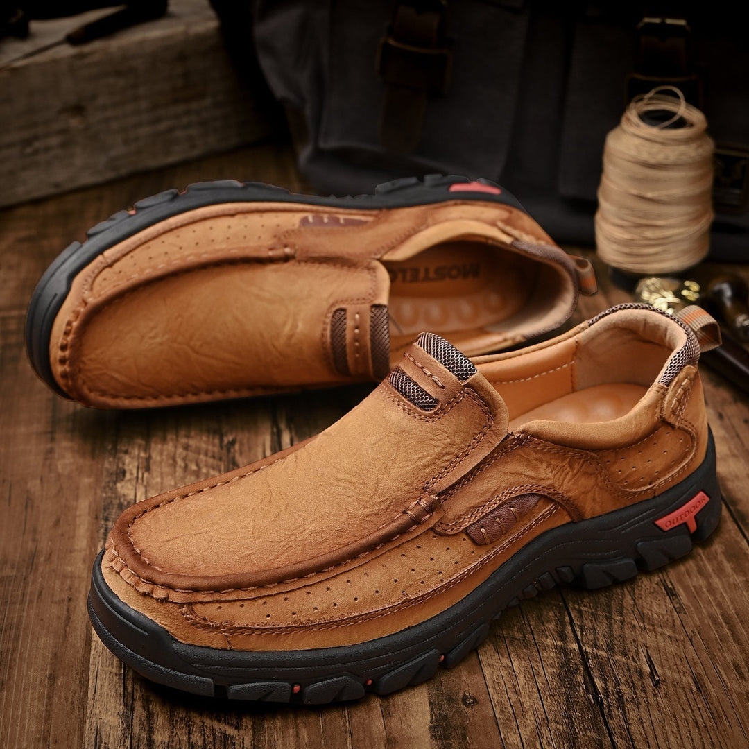 Men's brown orthopedic transition boots, comfortable, paired with rugged outdoor clothing, leather.