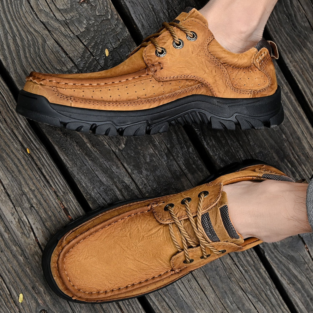 Black orthopedic men's boots, versatile for various outfits, comfortable fit
