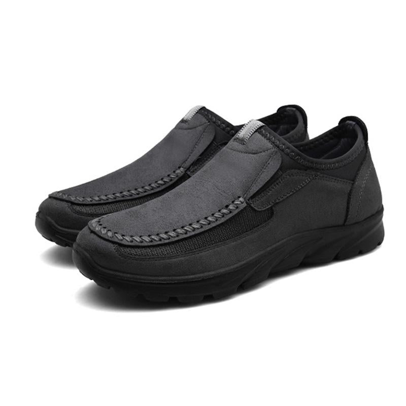 Detailed shot of the non-slip outsole on men's leather walking shoes