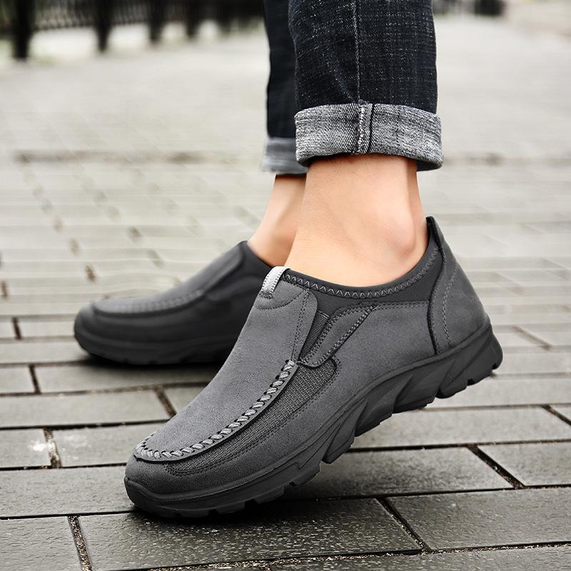 Side view of men's casual orthopedic shoe, non-slip sole visible