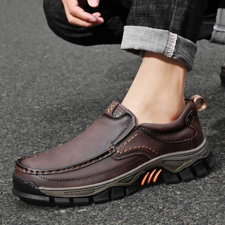 Men's orthopedic transition boots, black leather, close-up of durable, comfortable sole
