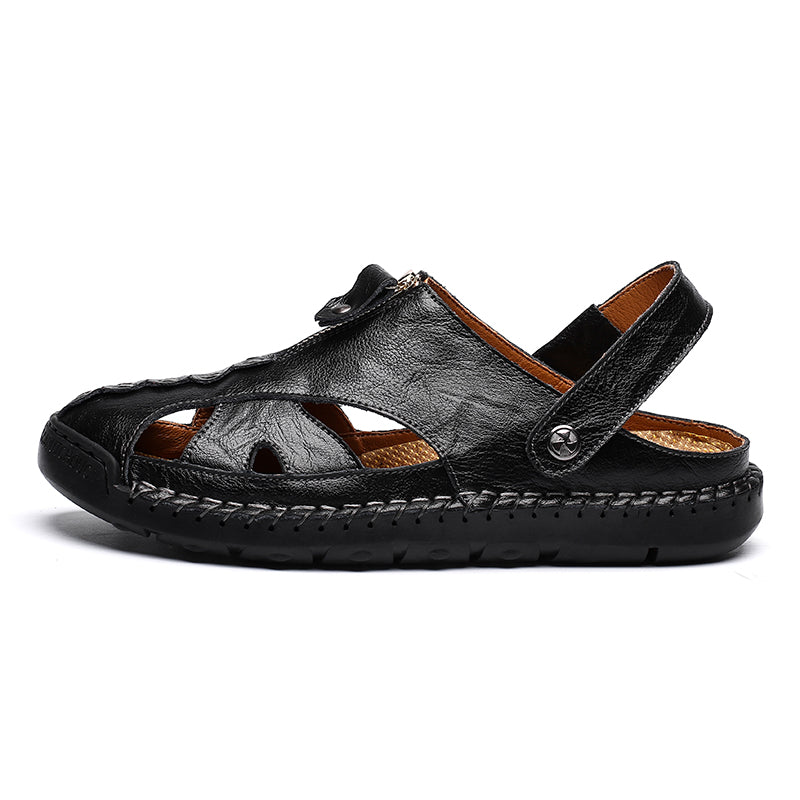 Men's comfortable closed-toe leather sandals, worn by a model in outdoor setting