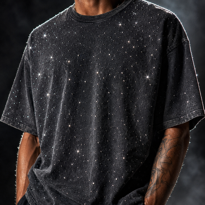 Relaxed fit men's crewneck tee featuring sparkling rhinestones & short sleeves, perfect for summer.
