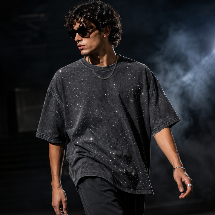 Streetwear men's fashion: oversized short sleeve t-shirt with unique rhinestone embellishment.