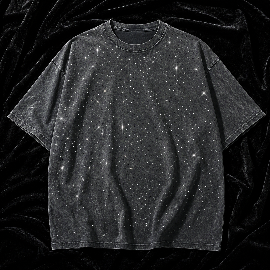 Model wearing a relaxed fit men's oversized rhinestone t-shirt, showcasing casual style.