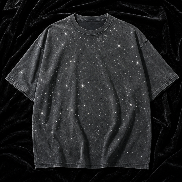 Model wearing a relaxed fit men's oversized rhinestone t-shirt, showcasing casual style.