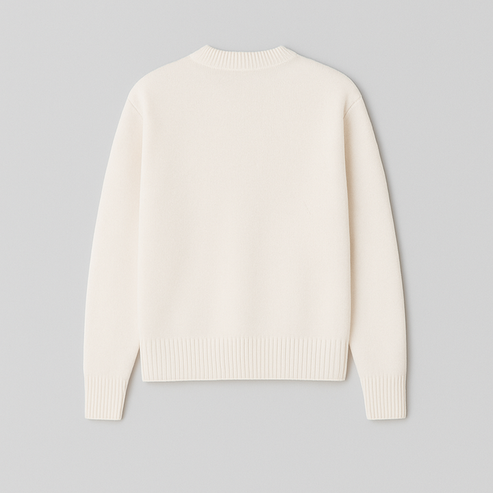 Relaxed fit men's oversized sweater with a bold heart motif. Cozy crew neck for fall/winter.