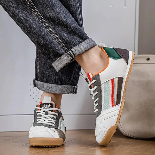 Everyday men's sneakers, featuring a trendy patchwork design & robust utility for all terrains.