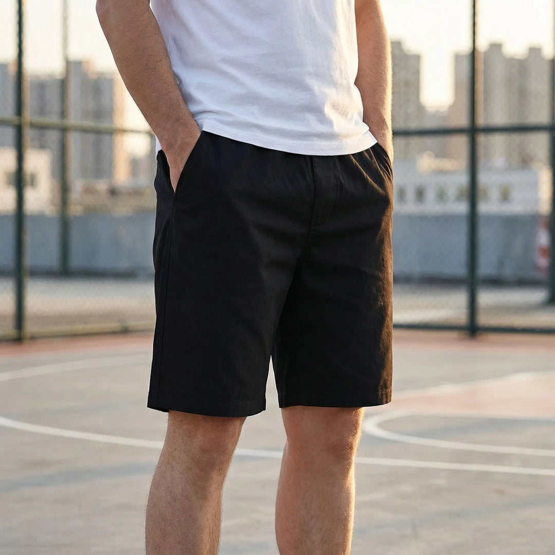 Men's plus size casual knee-length shorts, ideal for streetwear. Comfortable relaxed fit with elastic waist.