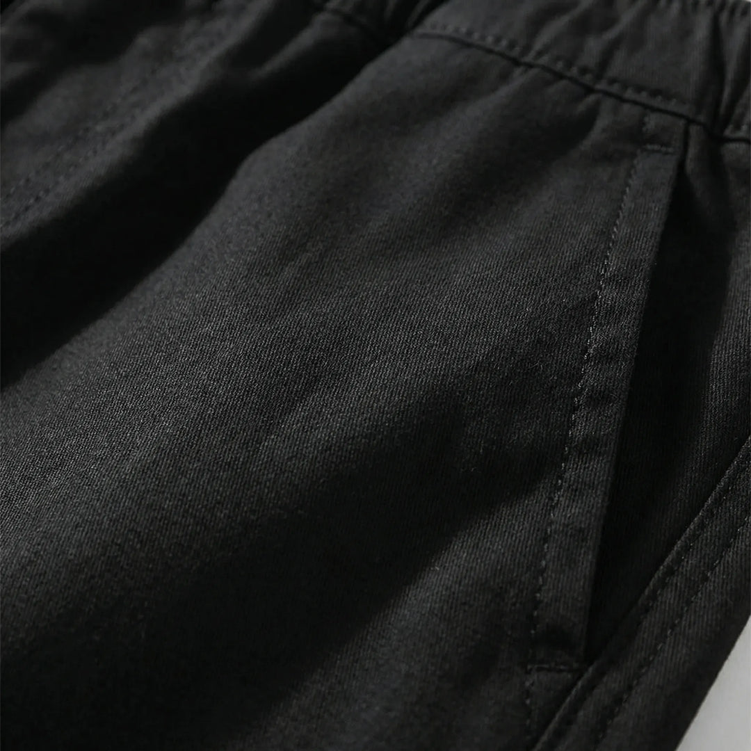 Comfortable plus size men's shorts, knee-length, with elastic waist for a relaxed everyday fit.