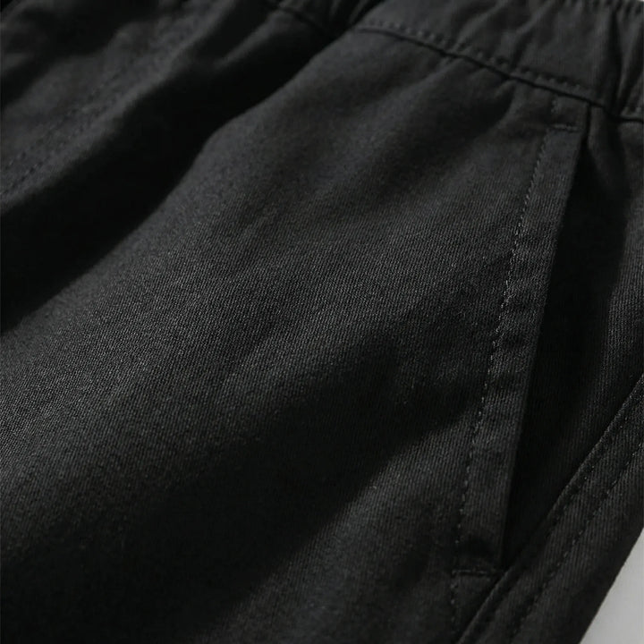 Comfortable plus size men's shorts, knee-length, with elastic waist for a relaxed everyday fit.