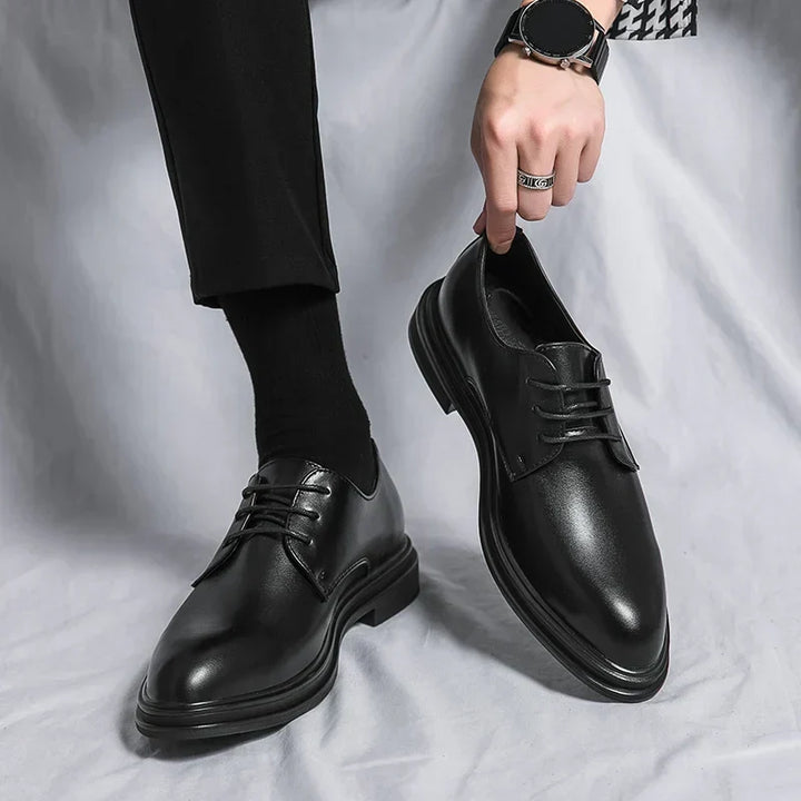 Black patent leather men's Derby shoes with a polished finish. Ideal for weddings, proms & formal occasions.