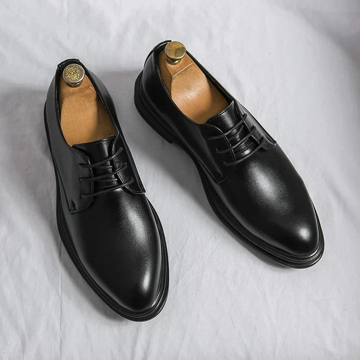 Polished black patent Derby dress shoes for men, a classic choice for formal attire, evening wear, or special events.