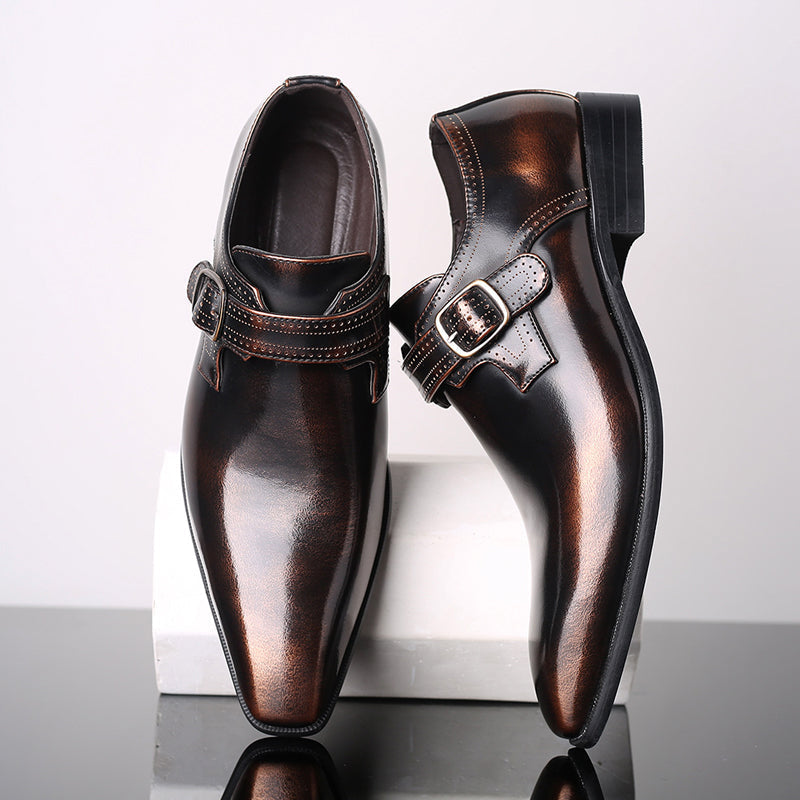 Men's polished leather monk strap dress shoes with a sleek single buckle, ideal for formal business attire.