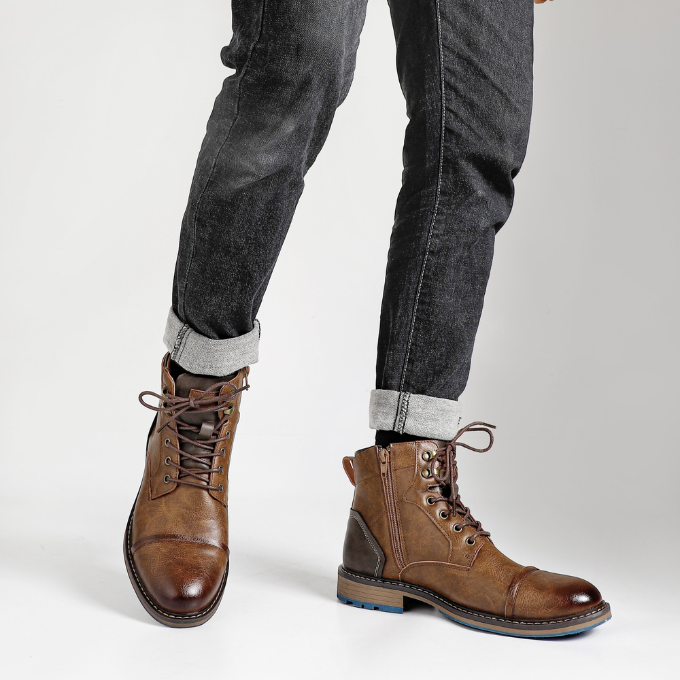 Side profile of men's leather casual boots, highlighting the convenient side zipper and sturdy design.