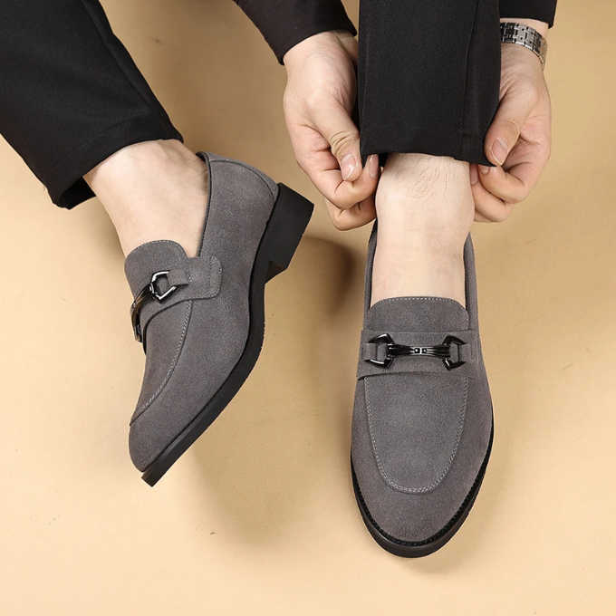 Side view of premium black suede loafers, ideal for men's fashion and casual dress.