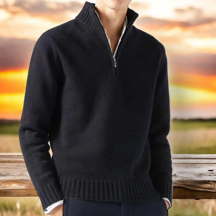 Detail of the quarter-zip closure on a luxurious men's cashmere blend sweater, premium design