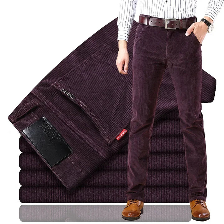 Full-length shot of men's tailored corduroy trousers, showcasing texture and elegant drape, perfect for workwear.