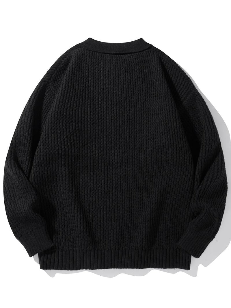 Stylish men's knit polo sweater in a rich color, featuring a textured design and classic collar.