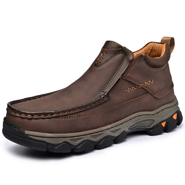Close-up of men's casual leather slip-on shoes, black, with detailed stitching and comfort sole