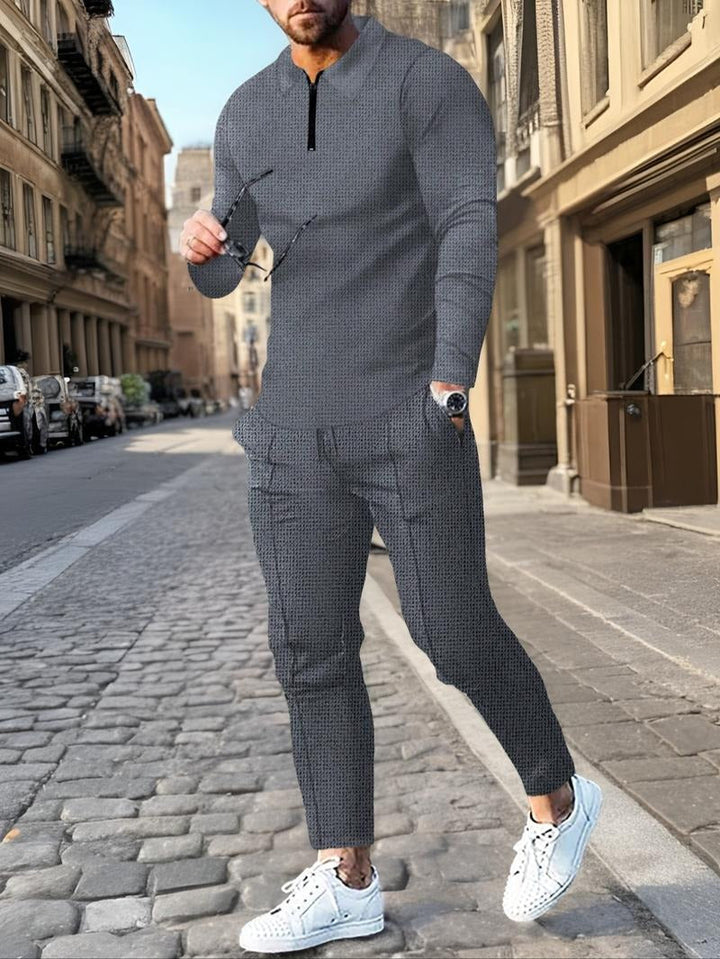 Versatile men's two-piece casual wear: a textured knit lounge set with a modern zip neck design.