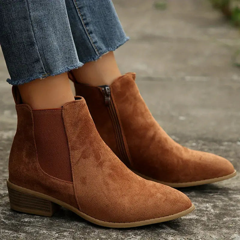 Brown men's Chelsea pull-on ankle boots. Stylish & comfortable for versatile casual or dressy outfits.
