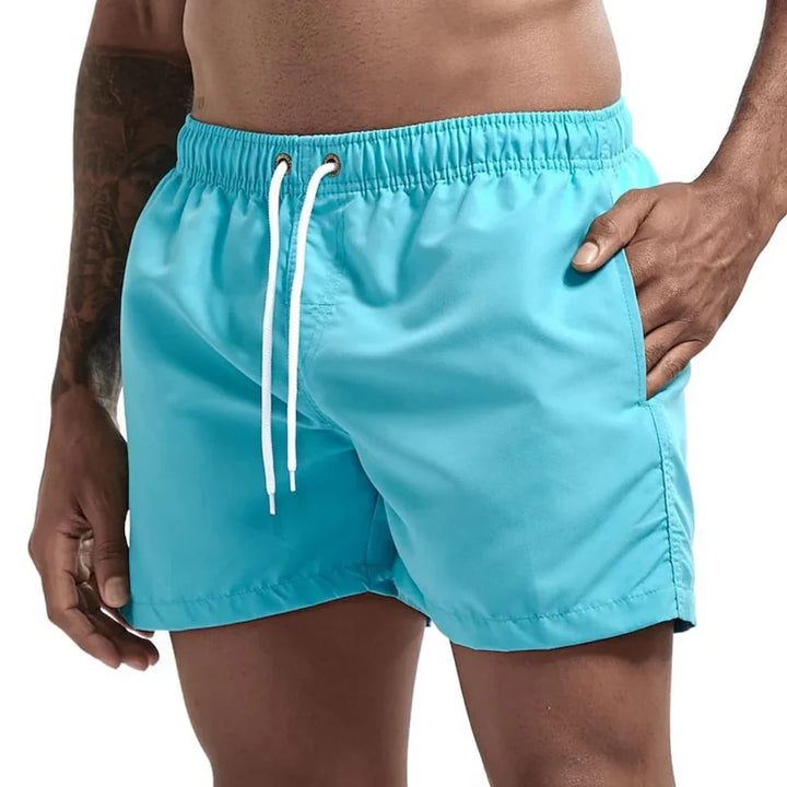Men's quick-dry performance swim shorts for beach & pool; ideal for active summer wear & water sports.