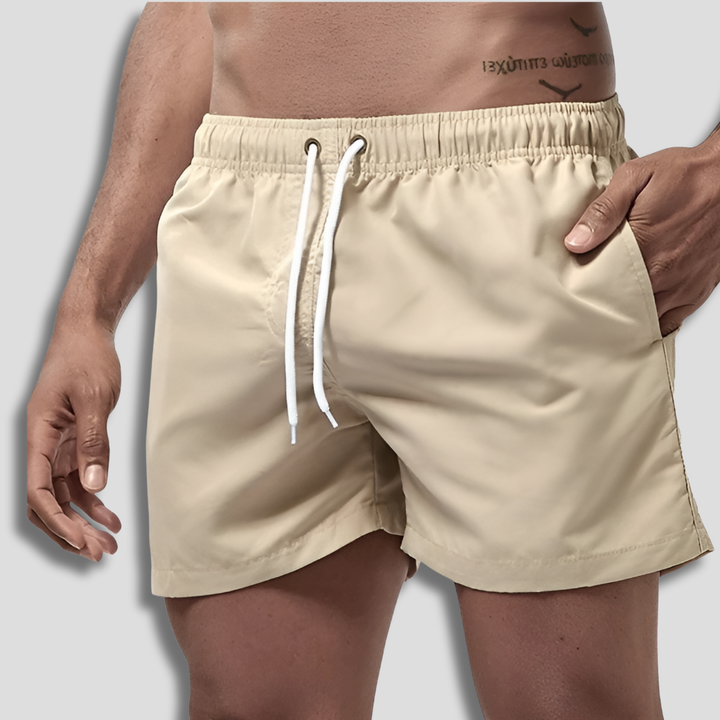 Durable men's quick-dry swim shorts, stylish and comfortable for beach, pool, and summer vacation wear.