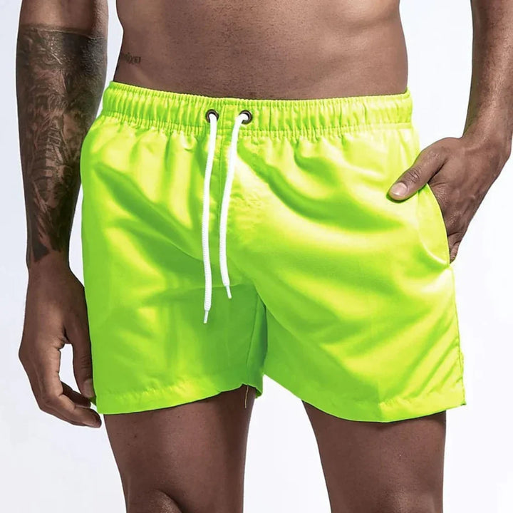 Men's summer quick-dry swim shorts; comfortable, stylish, and perfect for beach, pool, and water sports.