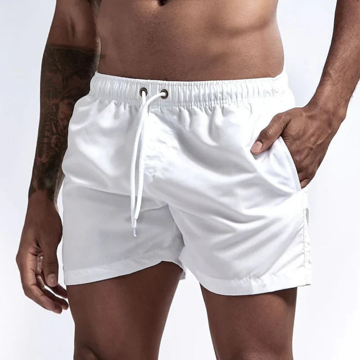 Stylish men's comfortable swim shorts, perfect quick-dry beachwear & pool shorts for summer vacation.