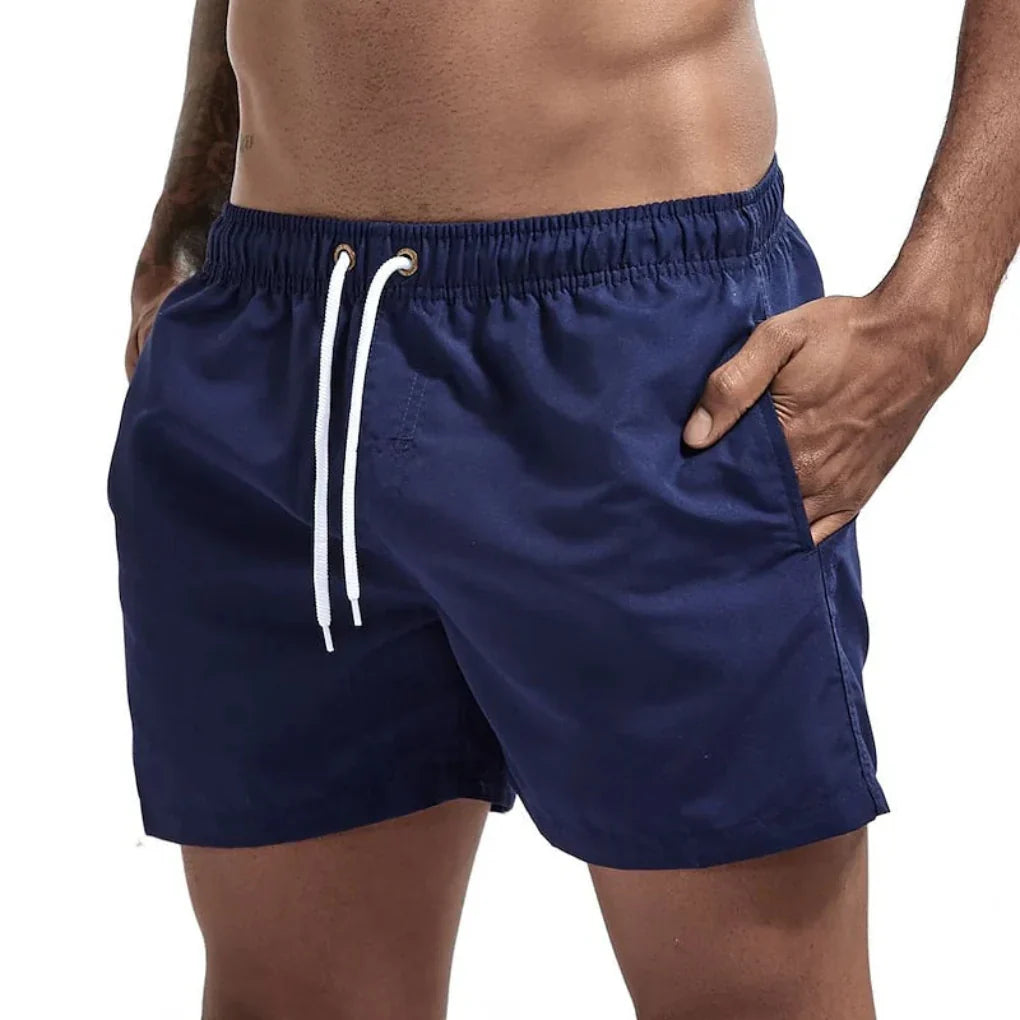 Quick-dry men's swim shorts, comfortable beachwear for summer holidays, pool, and active water sports.