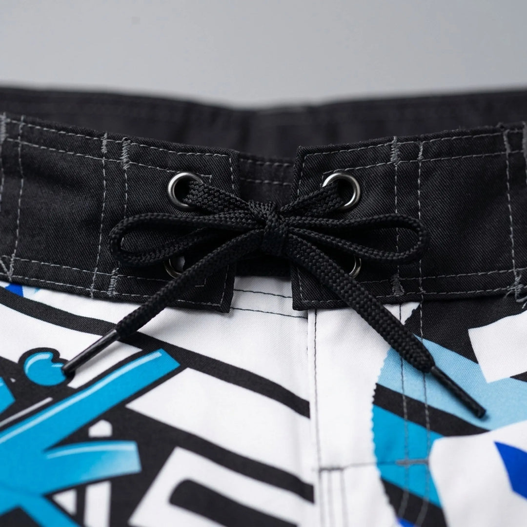Men's quick-dry swim shorts featuring a modern geometric print, great for beachwear & pool.