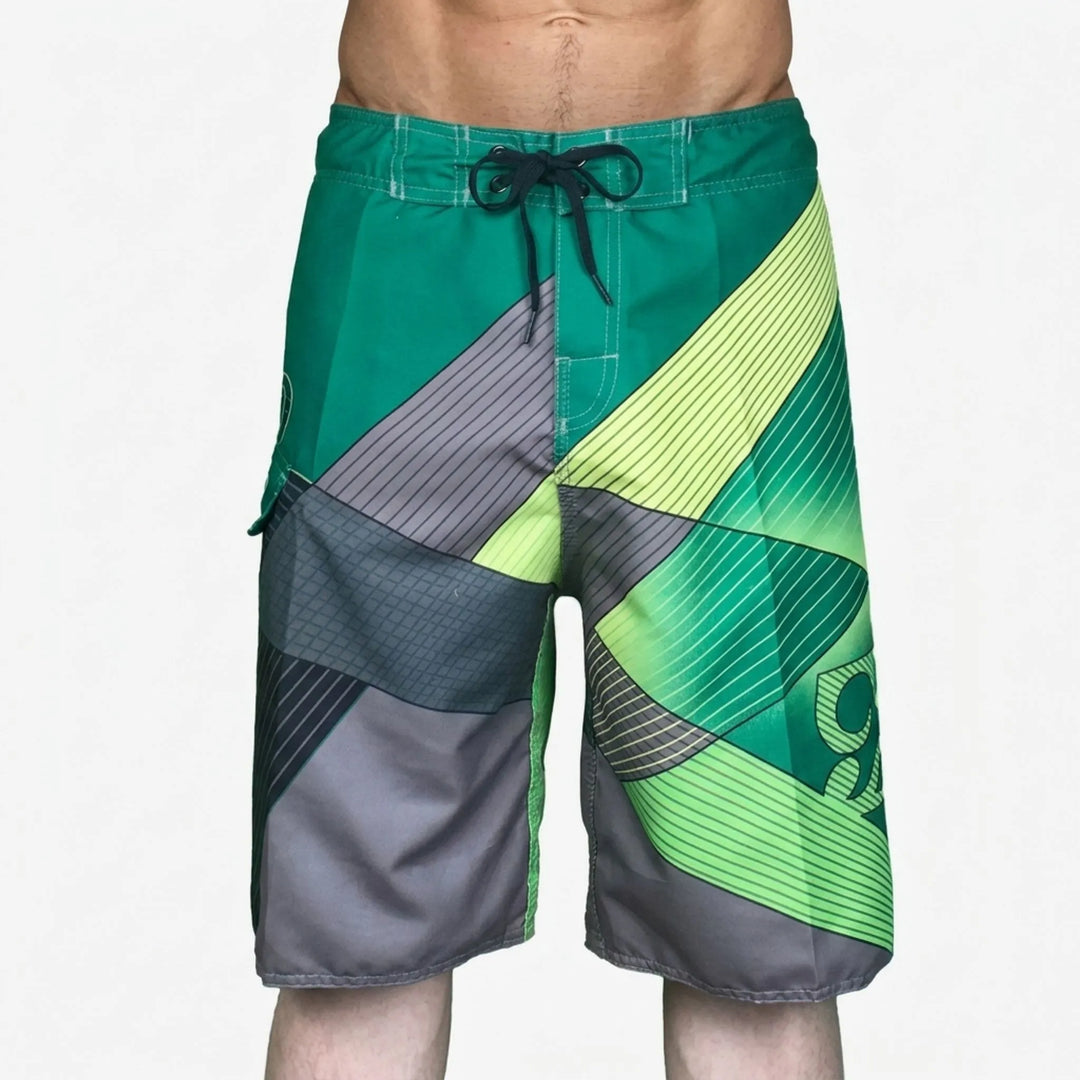 Men's quick-dry printed swim shorts in a contemporary design, perfect for beach & pool.