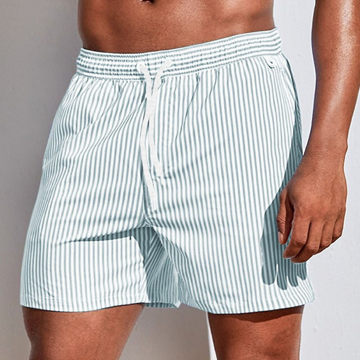 Performance-focused men's quick-dry striped swim trunks, ideal active shorts for the beach or pool.