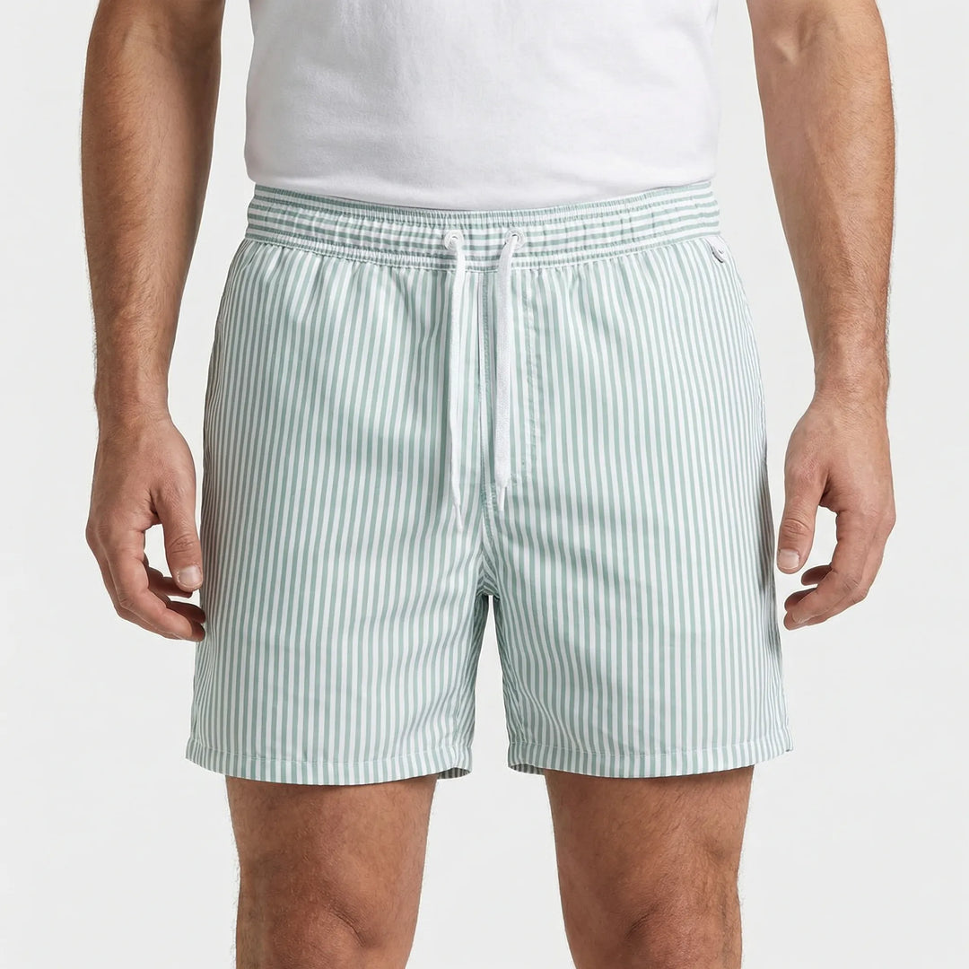 Summer-ready men's striped swim shorts. Quick-dry beachwear offering comfort and style for vacation.