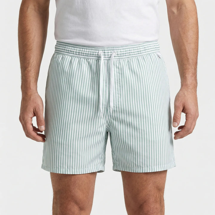 Summer-ready men's striped swim shorts. Quick-dry beachwear offering comfort and style for vacation.