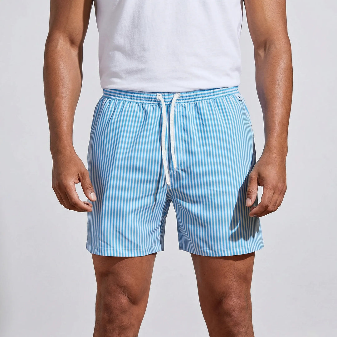 Performance men's quick-dry striped swim trunks. Modern beach & pool shorts with athletic style.
