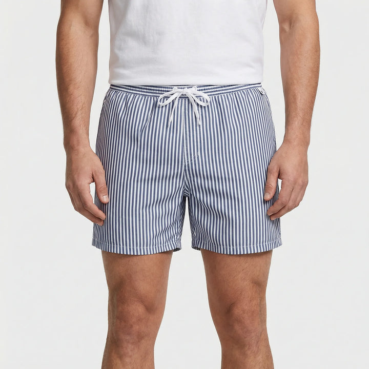 Versatile men's striped quick-dry swim trunks. Ideal vacation essential for beach, pool, and casual wear.