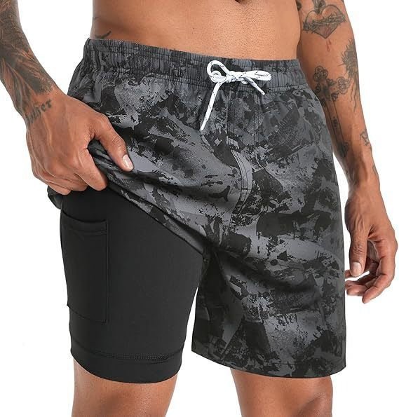 High-performance men's quick-dry swim shorts featuring a supportive compression liner and drawstring.