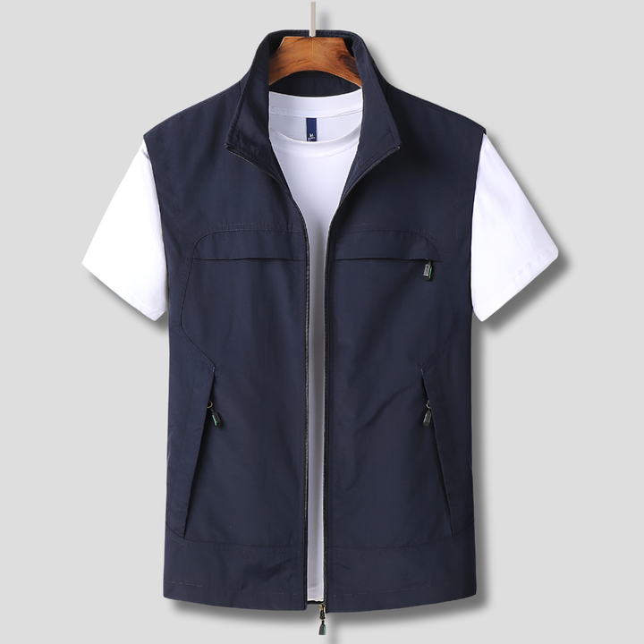 Men's quick-dry utility vest with multiple pockets for outdoor activities, travel, and hiking. Lightweight activewear.