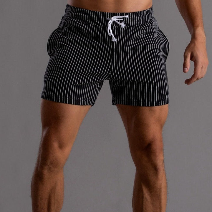 Back view: Men's quick-dry swim shorts. Comfortable fit men's summer swimwear, ideal for vacation.